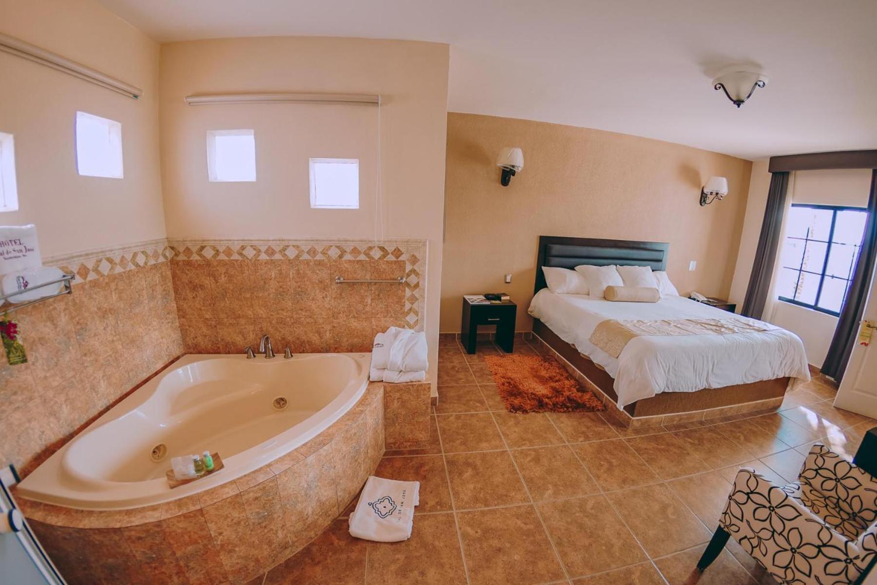 Suite con bañera de hidromasaje - Cama extragrande