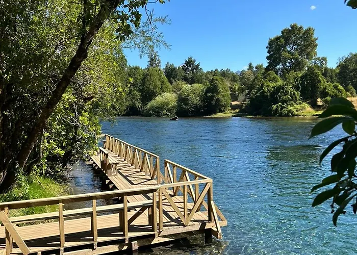 Cabañas Los Canelos Pucon, Hermosa Granja de 20 hectaréas a orillas del Río Liucura